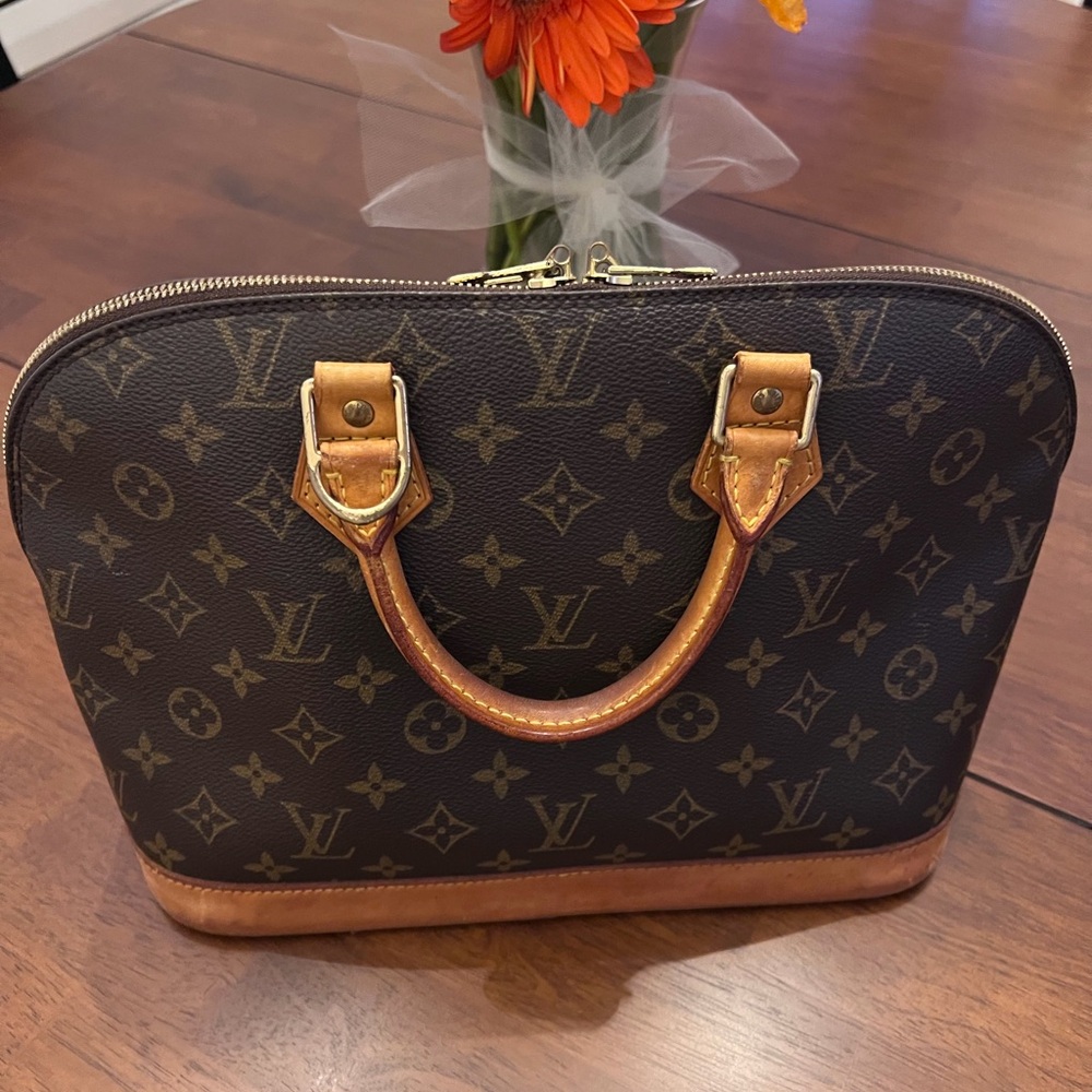 Louis Vuitton Monogram Brown Alma Handbag